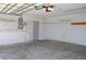 Clean garage with overhead door and pegboard at 21332 Walling Ct, Port Charlotte, FL 33954