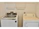 Bright laundry room with washer and dryer at 21332 Walling Ct, Port Charlotte, FL 33954