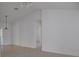 An open-concept living room featuring tile floors and vaulted ceilings at 21332 Walling Ct, Port Charlotte, FL 33954