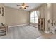 Spacious room with neutral carpet, large window for natural light and ceiling fan at 24528 Sunrise Dr, Punta Gorda, FL 33980