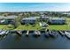 Scenic waterfront condos feature private docks, a communal pool, and verdant landscaping at 3233 Wood Thrush Dr # 23C, Punta Gorda, FL 33950
