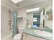 Cozy bathroom with shower-tub combo and ample lighting at 3233 Wood Thrush Dr # 23C, Punta Gorda, FL 33950