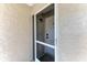 Front door with a screen door for ventilation and natural light at 3233 Wood Thrush Dr # 23C, Punta Gorda, FL 33950