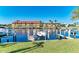 This photo has a great view of the water and boats, and nearby buildings at 3233 Wood Thrush Dr # 23C, Punta Gorda, FL 33950