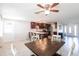 View of dining area, kitchen, and living room featuring a modern design at 3348 Pinetree St, Port Charlotte, FL 33952