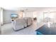 Open-concept living space, with tile flooring, neutral color palette, and seamless flow into adjacent areas at 3348 Pinetree St, Port Charlotte, FL 33952