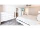 Bright bedroom with modern decor, wood floors, and plenty of storage at 3348 Pinetree St, Port Charlotte, FL 33952