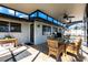 Covered patio featuring a dining set for outdoor entertaining and dining at 3348 Pinetree St, Port Charlotte, FL 33952