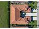 Overhead shot of complex showcasing tiled roofs, carports, and manicured landscaping at 3959 San Rocco Dr # 612, Punta Gorda, FL 33950
