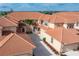 Exterior shot highlighting the building's facade, roof, landscaping, and driveway at 3959 San Rocco Dr # 612, Punta Gorda, FL 33950
