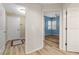 Hallway view that highlights the seamless flow, connecting the main hall and the adjacent bedrooms and bathrooms at 3959 San Rocco Dr # 612, Punta Gorda, FL 33950