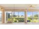 Relaxing lanai with golf course views through expansive windows at 3959 San Rocco Dr # 612, Punta Gorda, FL 33950