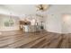 Open-concept living area with modern flooring, kitchen island, and plenty of natural light at 3959 San Rocco Dr # 612, Punta Gorda, FL 33950
