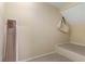 Small storage space with a bare concrete floor and a shelf for added storage convenience at 3959 San Rocco Dr # 612, Punta Gorda, FL 33950