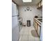 Cozy kitchen featuring tiled floors, modern appliances, and ample counter space at 4000 Oakview Dr # L2, Punta Gorda, FL 33980