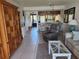 Open-concept living and dining area with tile floors, view of kitchen, comfortable seating and natural light at 4000 Oakview Dr # L2, Punta Gorda, FL 33980