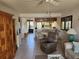 Open living area with tile flooring, comfortable seating, and an adjacent dining area, creating a welcoming atmosphere at 4000 Oakview Dr # L2, Punta Gorda, FL 33980