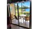 Enclosed patio with view of the lake at 4000 Oakview Dr # L2, Punta Gorda, FL 33980