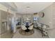 Bright dining area with stainless steel appliances and a breakfast nook with natural light at 522 Lomond Dr, Port Charlotte, FL 33953