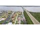 Beautiful aerial view of waterfront homes with private boat docks and quick access to the open waterways at 5244 Early Ter, Port Charlotte, FL 33981