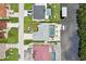 Aerial view of a waterfront property with a pool, boat lift, and meticulous landscaping at 5244 Early Ter, Port Charlotte, FL 33981