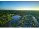Scenic aerial view of waterfront homes nestled along winding waterways, offering stunning views of the area at 5244 Early Ter, Port Charlotte, FL 33981