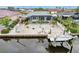 Picture presents an outdoor living space featuring a private pool and boat dock on the water at 5244 Early Ter, Port Charlotte, FL 33981