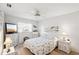 Cozy bedroom features a ceiling fan, window, television, and dressers at 5244 Early Ter, Port Charlotte, FL 33981