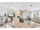 Spacious living room with cozy seating, neutral decor, and abundant natural light at 5244 Early Ter, Port Charlotte, FL 33981