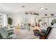 Cozy living room with comfortable seating, neutral color palette, and bright, natural light at 5244 Early Ter, Port Charlotte, FL 33981