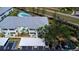 Aerial view of condominium buildings with parking and a pool area at 5725 Greenwood Ave # 3104, North Port, FL 34287
