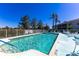 Community pool features a large open pool deck with plenty of seating at 5725 Greenwood Ave # 3104, North Port, FL 34287