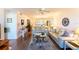 Spacious living room with sleek furniture and an open layout for entertaining at 5725 Greenwood Ave # 3104, North Port, FL 34287