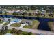 Wide aerial view of home on canal at 855 Rotonda Cir, Rotonda West, FL 33947