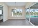 Bright dining room with scenic water view at 855 Rotonda Cir, Rotonda West, FL 33947