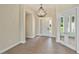 Inviting foyer with modern lighting and an open floor plan at 855 Rotonda Cir, Rotonda West, FL 33947