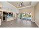 Open-concept living area with recessed lighting and sliding glass doors to the pool area at 855 Rotonda Cir, Rotonda West, FL 33947