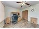 Bedroom featuring a ceiling fan, closet and workstation at 1052 Hinton St, Port Charlotte, FL 33952