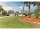 Single-story home with a garden in the front yard at 1052 Hinton St, Port Charlotte, FL 33952
