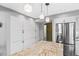 Kitchen featuring abundant storage cabinets, stainless appliances, and granite countertops at 1225 Neapolitan Rd, Punta Gorda, FL 33983