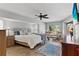 Spacious main bedroom with ceiling fan, reading nook, and exterior access at 1225 Neapolitan Rd, Punta Gorda, FL 33983