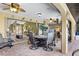 Inviting covered patio featuring stylish furniture, ceiling fans, and seamless access to the interior living spaces at 1225 Neapolitan Rd, Punta Gorda, FL 33983