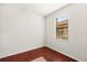 Bedroom with hardwood flooring and a window for natural light at 12285 Canavese Ln, Venice, FL 34293