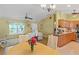 Open-concept living room and kitchen with modern appliances and ample counter space at 1333 Mendavia Ter, North Port, FL 34286