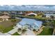 Expansive aerial view showcasing the home, waterfront access, and lush landscaping at 1334 Via Milanese, Punta Gorda, FL 33950