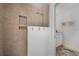 Bright bathroom showing a modern, tiled shower and a white vanity at 1334 Via Milanese, Punta Gorda, FL 33950