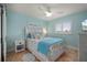 Comfortable bedroom showcasing a coastal style with charming decor and natural light at 1334 Via Milanese, Punta Gorda, FL 33950