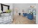 Bright living room with tile floors, comfortable seating, and sliding glass doors to the lanai at 1334 Via Milanese, Punta Gorda, FL 33950