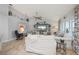Bright and airy living room with a comfortable sofa, stylish decor, and ample natural light at 1334 Via Milanese, Punta Gorda, FL 33950