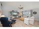 Open living room with a large entertainment center, plush seating, and stylish decor at 1334 Via Milanese, Punta Gorda, FL 33950